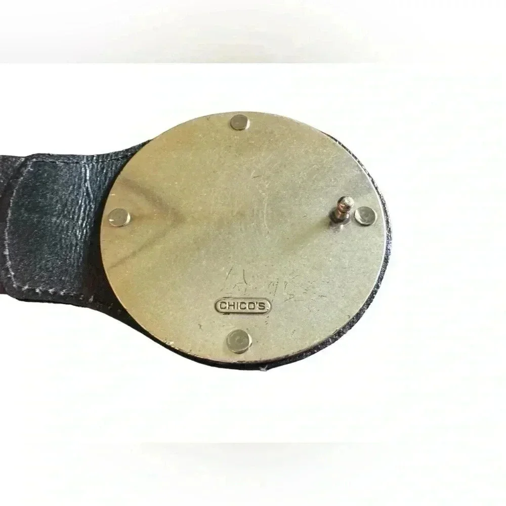 Chico’s black leather belt large round silver ornate coin style buckle